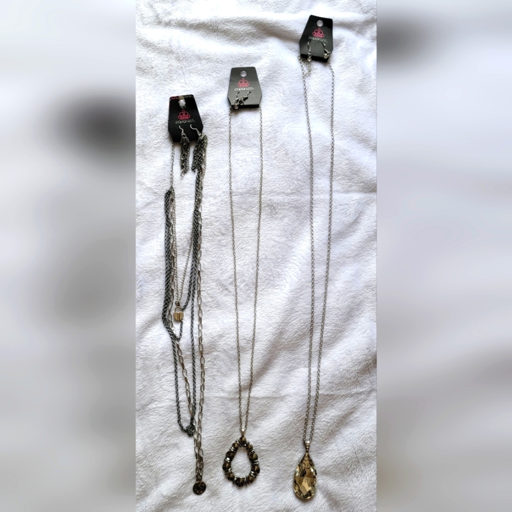 Brand new Bundle of 3 Paparazzi Necklaces with earrings